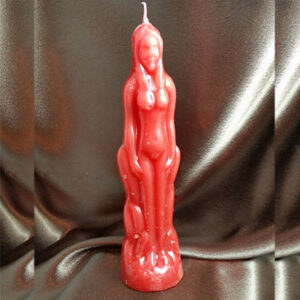 red female figural hoodoo candle